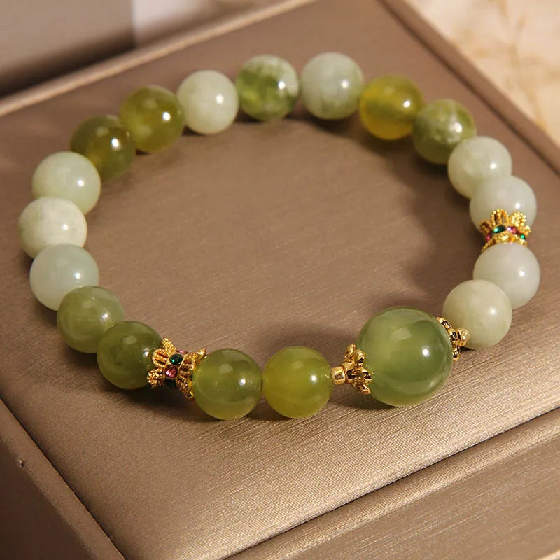 Xiuyan jade women's bracelet in jade green colour with original design.