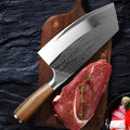 Stainless steel kitchen knife with 320mm blade length on a kitchen worktop