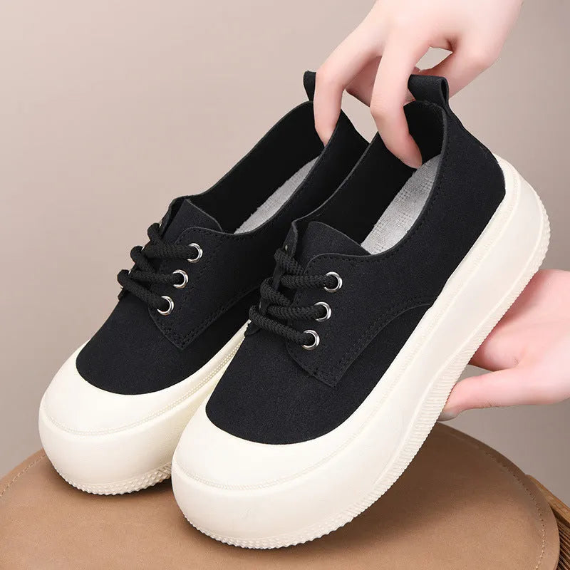 Women's beige suede platform loafers with a lace-up front and 4cm thick sole.