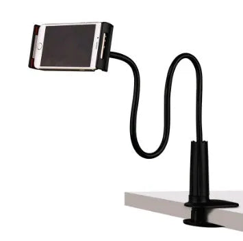 Black bedside oversize phone stand with a long adjustable arm on a wooden table.