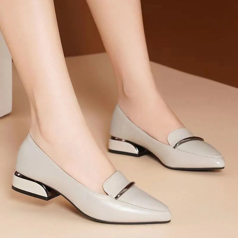 Black pointed soft-soled leather low-heel slip-on shoe with metal detail, mesh and PU upper