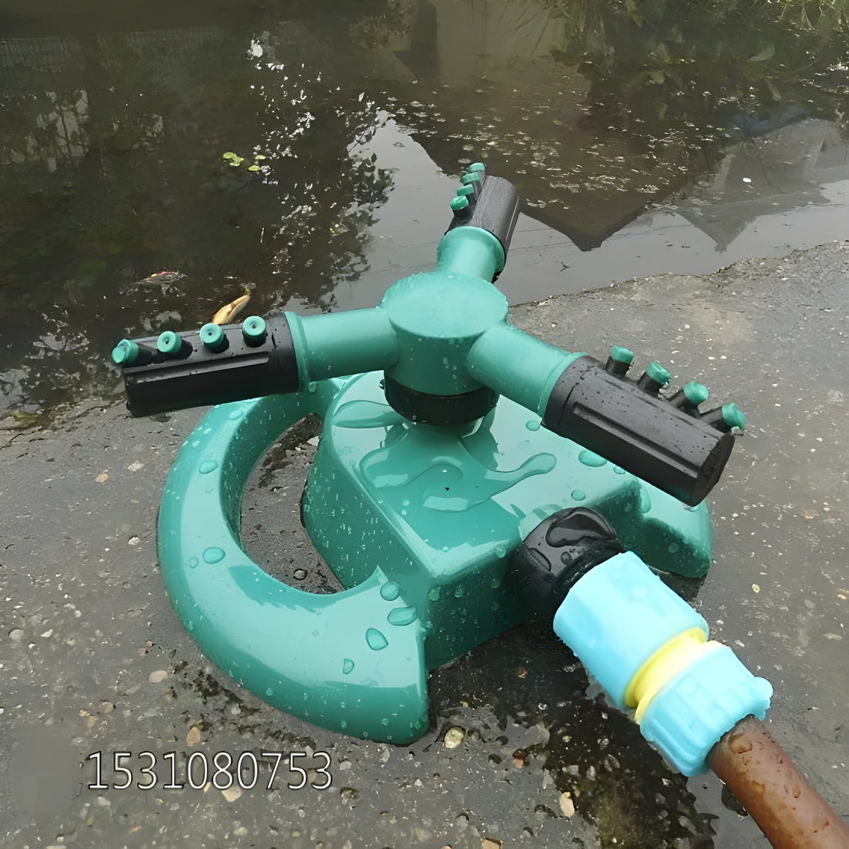 360 rotating garden sprinkler with three-fork base, 210mm x 190mm x 95mm, sprays up to 3m high and 5m wide