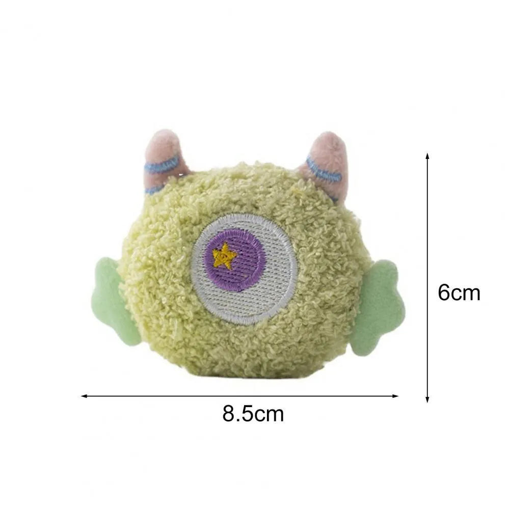 Cartoon plush dog chew toy with big eyes and squeaky sound feature.
