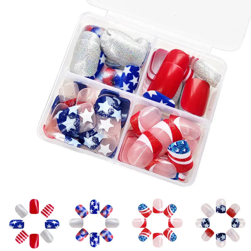 Independence Day nail art stickers with red, white, and blue five-pointed star designs on short square nails.