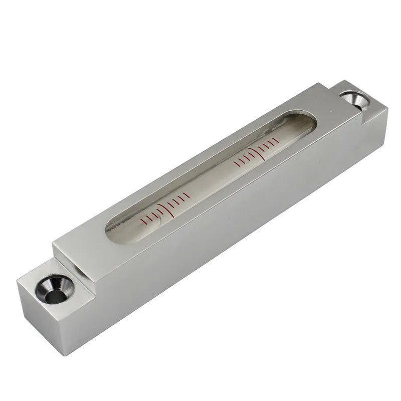 Compact metal and glass spirit level measuring 132mm with visible bubble vial containing 500 bubbles
