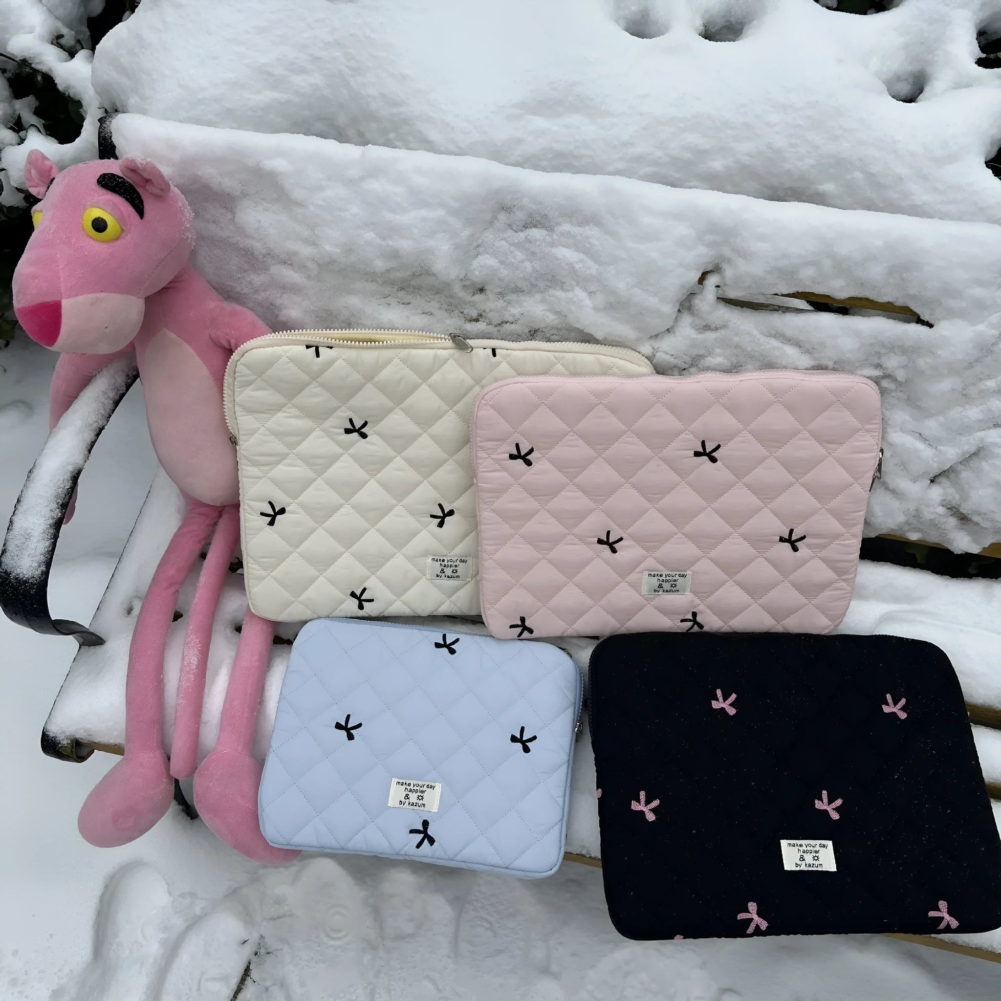 Rhombus embroidered bow notebook storage bag in nylon with device-specific sizing options