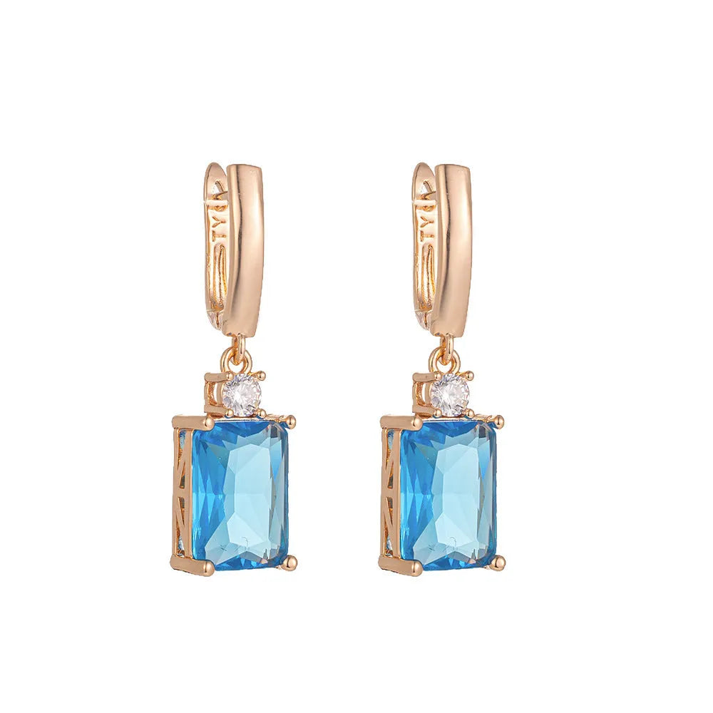 Square quadrilateral geometry earrings with electroplated gold or silver finish on copper construction