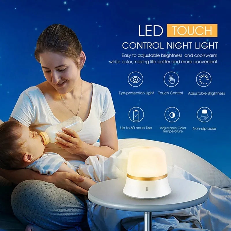 White touch control bedside night light with rechargeable battery and motion sensor on a table.