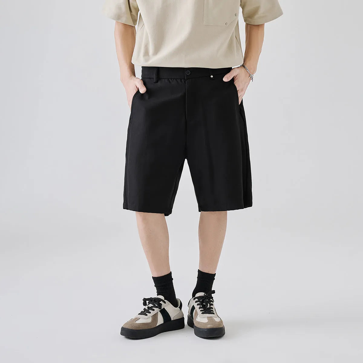 Men's loose-fit lyocell and cotton blend casual shorts in apricot colour.