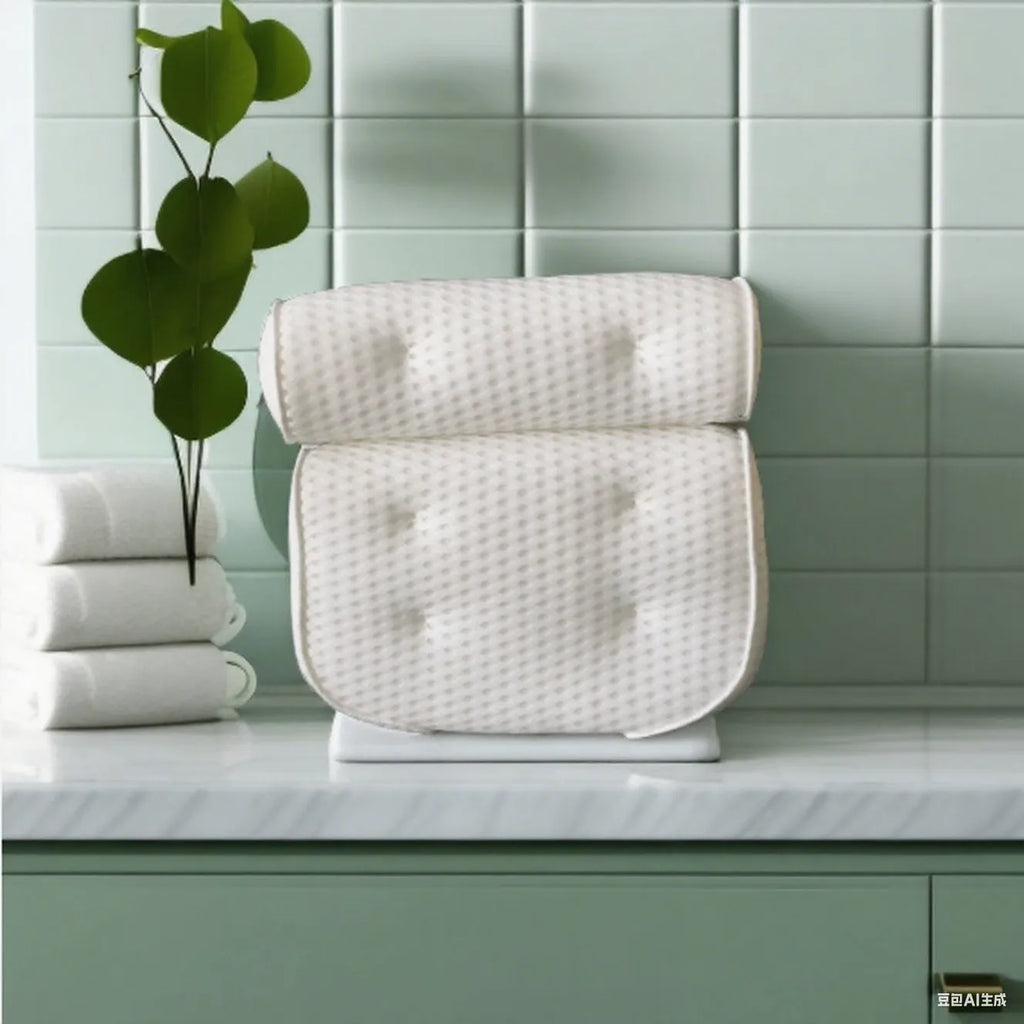 White bathtub pillow with mesh fabric and seven large suction cups on the back.