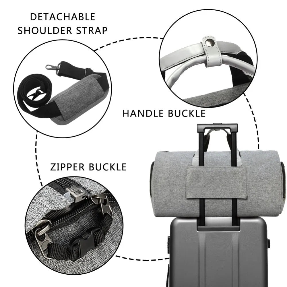 Travel garment bag in black and gray with adjustable shoulder strap, hanging suit carrier, and multiple pockets on a neutral background