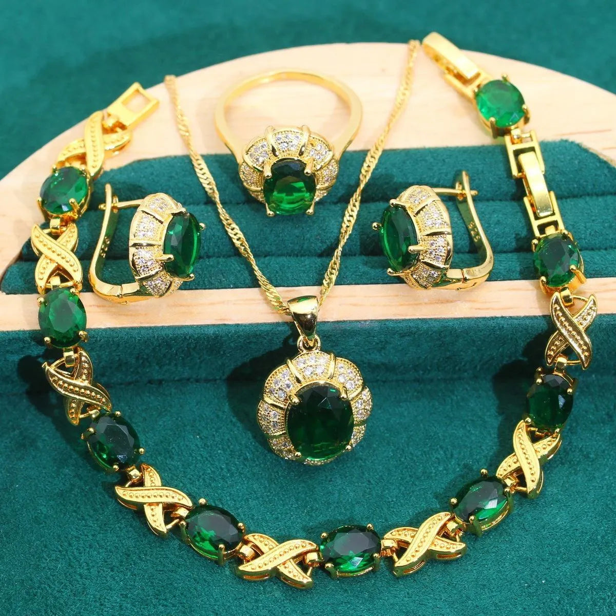 18k gold plated jewellery set with cubic zirconia stones showing necklace, earrings, ring, and bracelet