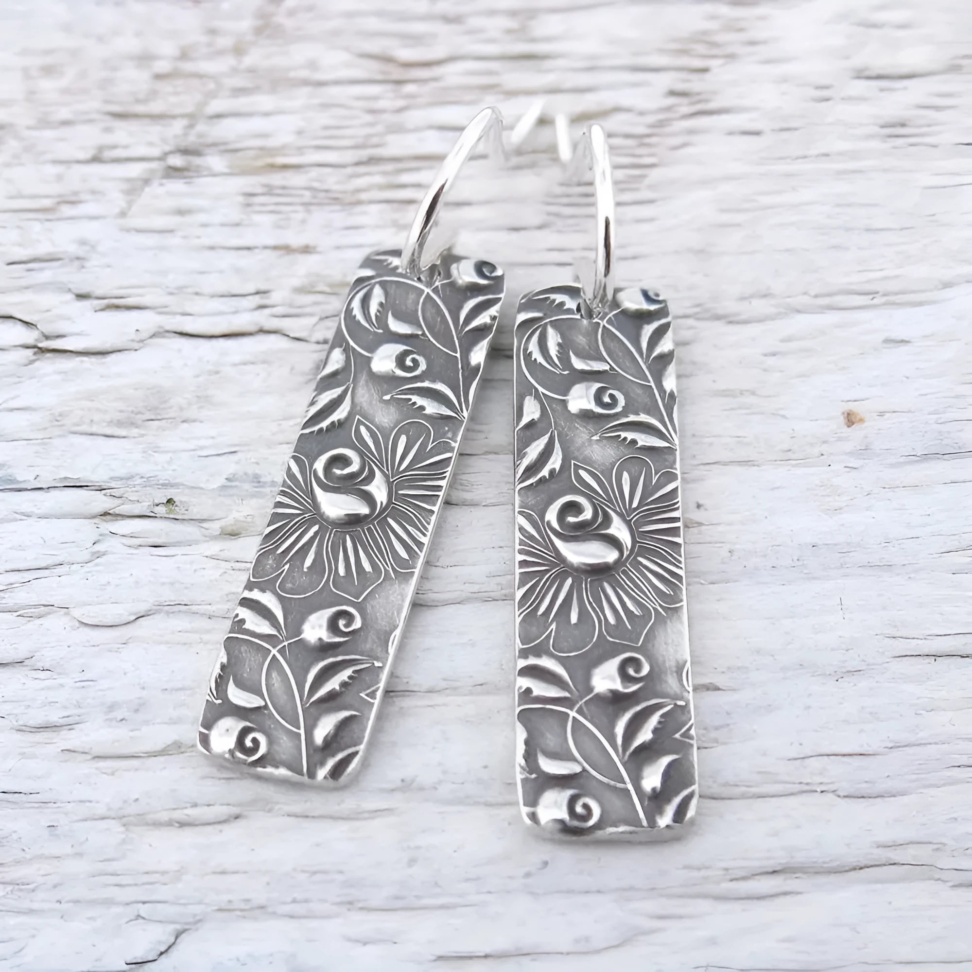 Long silver geometric earrings with carved vine design and retro European American style