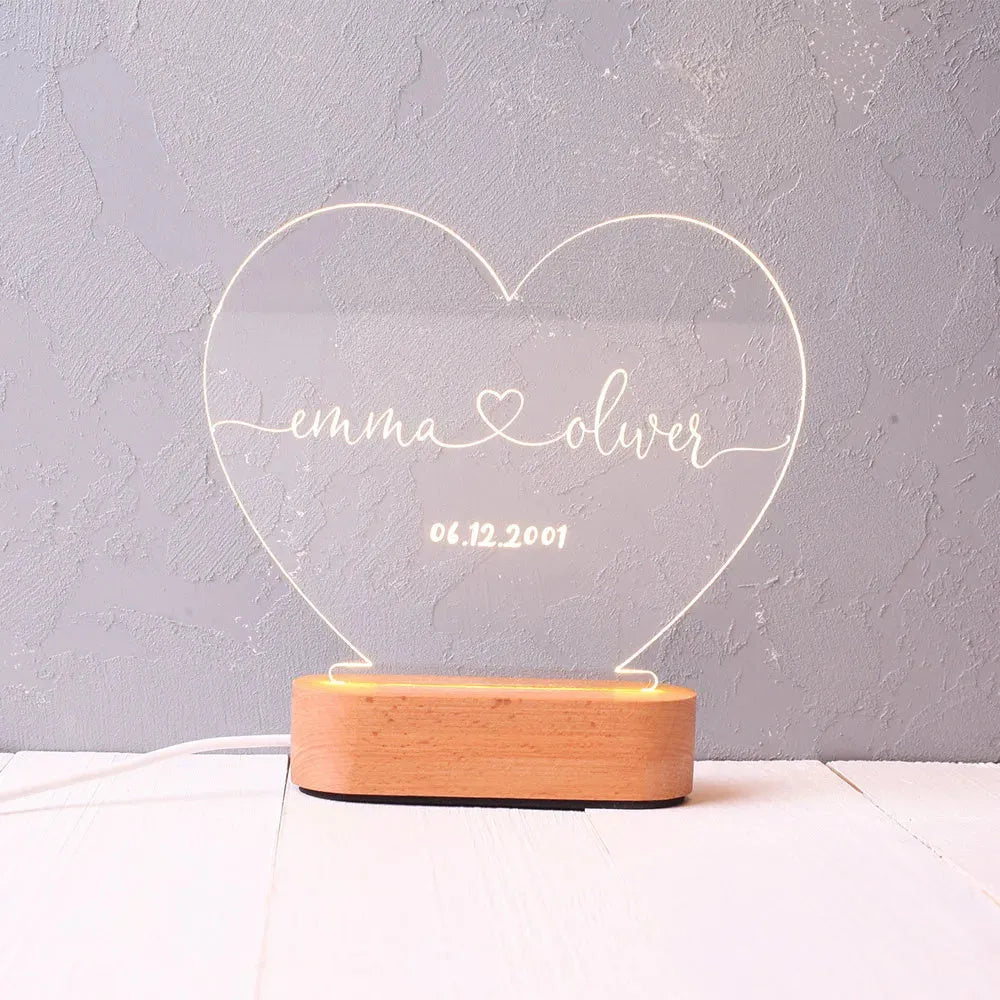Transparent custom acrylic night light with personalised text, measuring 20cm by 11.5cm.