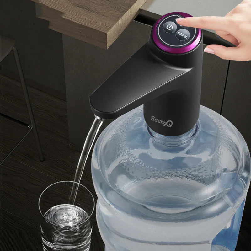 Dark grey touch automatic water dispenser on a kitchen countertop with soft hose and USB cable