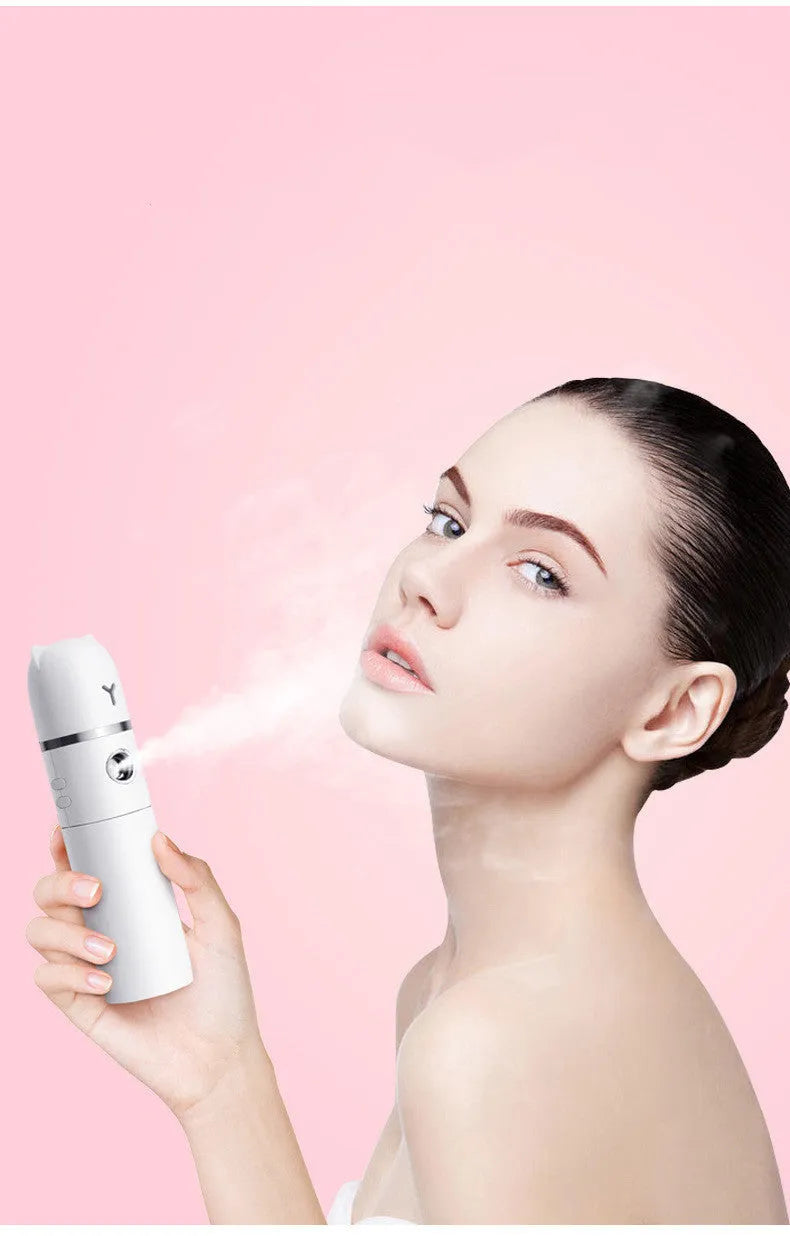 White USB rechargeable handheld spray fan with water tank, flashlight, and power bank function