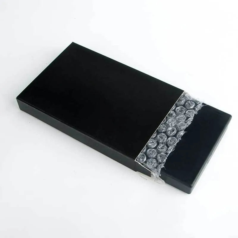 Eyeshadow compact palette with 120 colours in shimmer and matte finishes, measuring 15.6 by 10.5 by 2.4 cm.