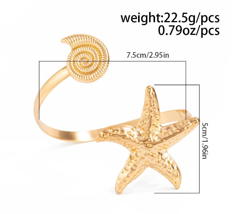 Gold plated alloy anklet with small starfish design on white background