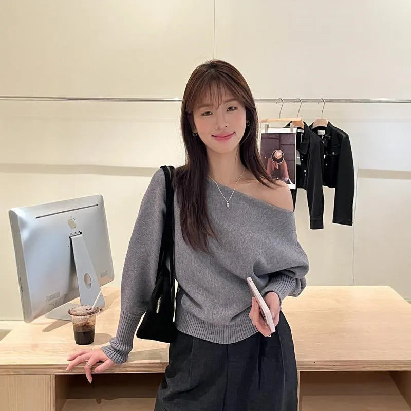 Women's light grey viscose fibre lazy blouse with long sleeves, shown in a relaxed fit.