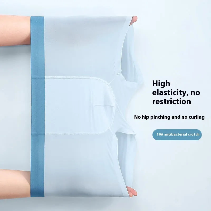 Men's ice silk antibacterial shorts in light blue showing seamless mid waist design