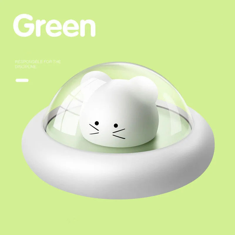 Space Moe Mouse children's bedroom night light in blue with push switch and warm LED glow on a bedside table