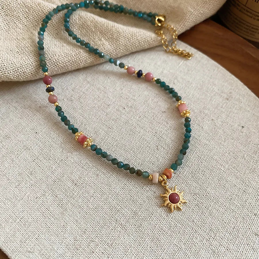 Freshwater pearl sun necklace with geometric pendant in French royal court style, blue and gold-blue-pink electroplated finishes
