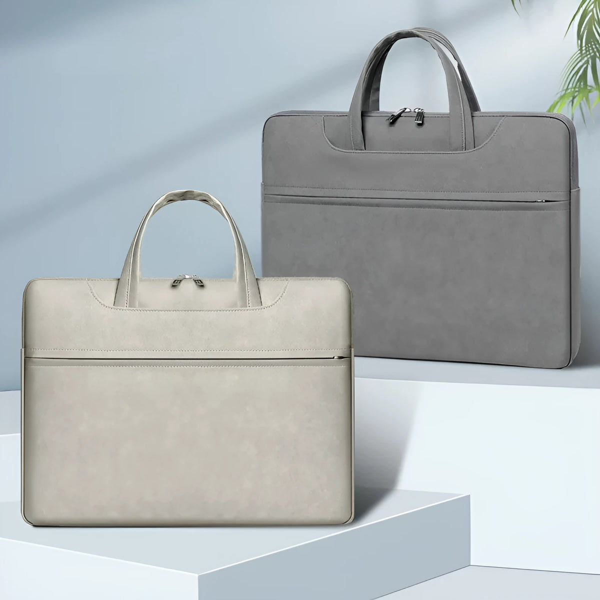 PU leather laptop case in light gray, one shoulder, with zipper closure and soft handle, 13 to 15 inch size options