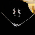 Silver alloy necklace and earrings set with zircon leaf design for bridal weddings