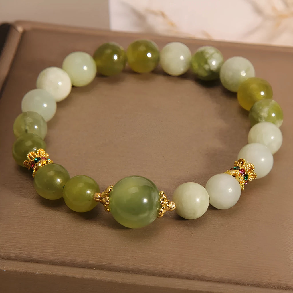 Xiuyan jade women's bracelet in jade green colour with original design.