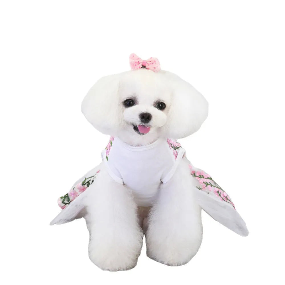 Cotton dog wedding dress in multi-leaf pink princess style on a small dog