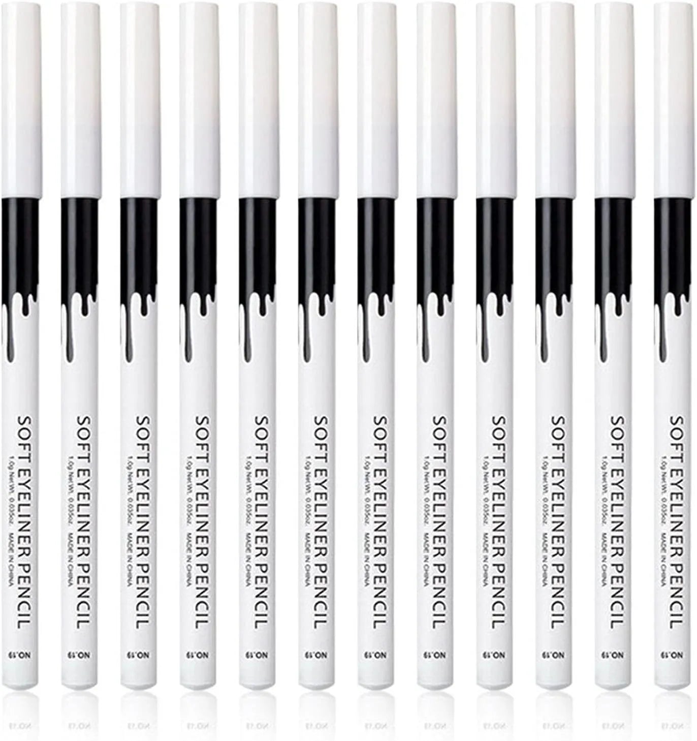 12 white and black retractable eyeliner pencils and a sharpener laid out on a flat surface.