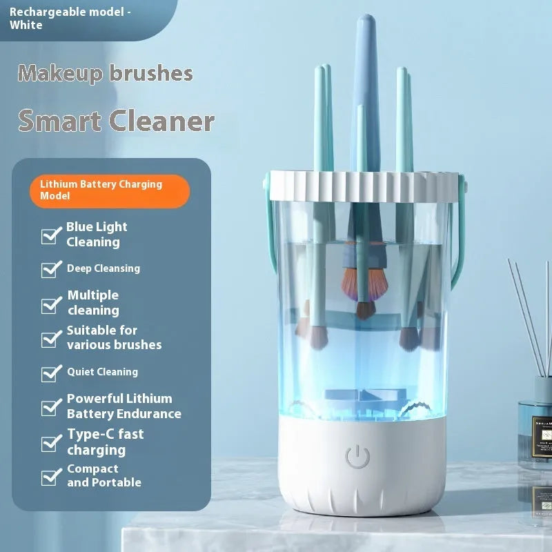White plastic rechargeable electric cleaning brush for makeup brushes with data cable.