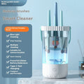 White plastic rechargeable electric cleaning brush for makeup brushes with data cable.