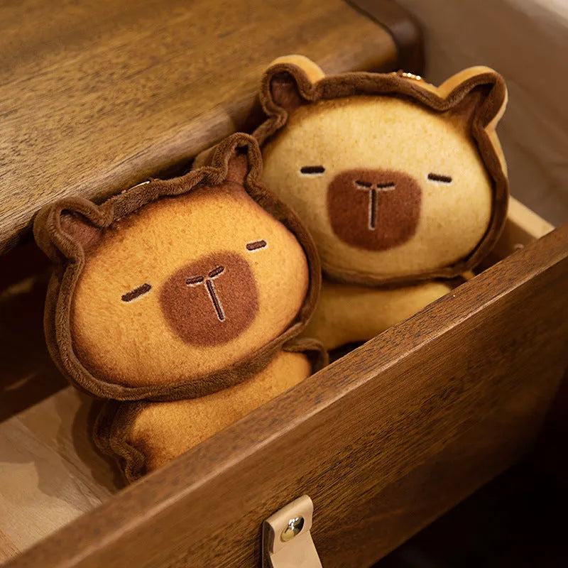 Toast kitty plush toy in caramel or light brown with soft PP cotton filling, available in 17cm, 30cm, and 50cm heights.