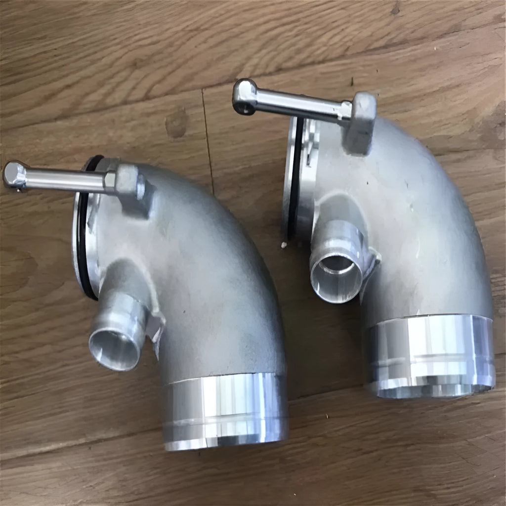 Aluminium alloy 90-degree turbocharger inlet elbow for lateral engine applications, colour as shown.