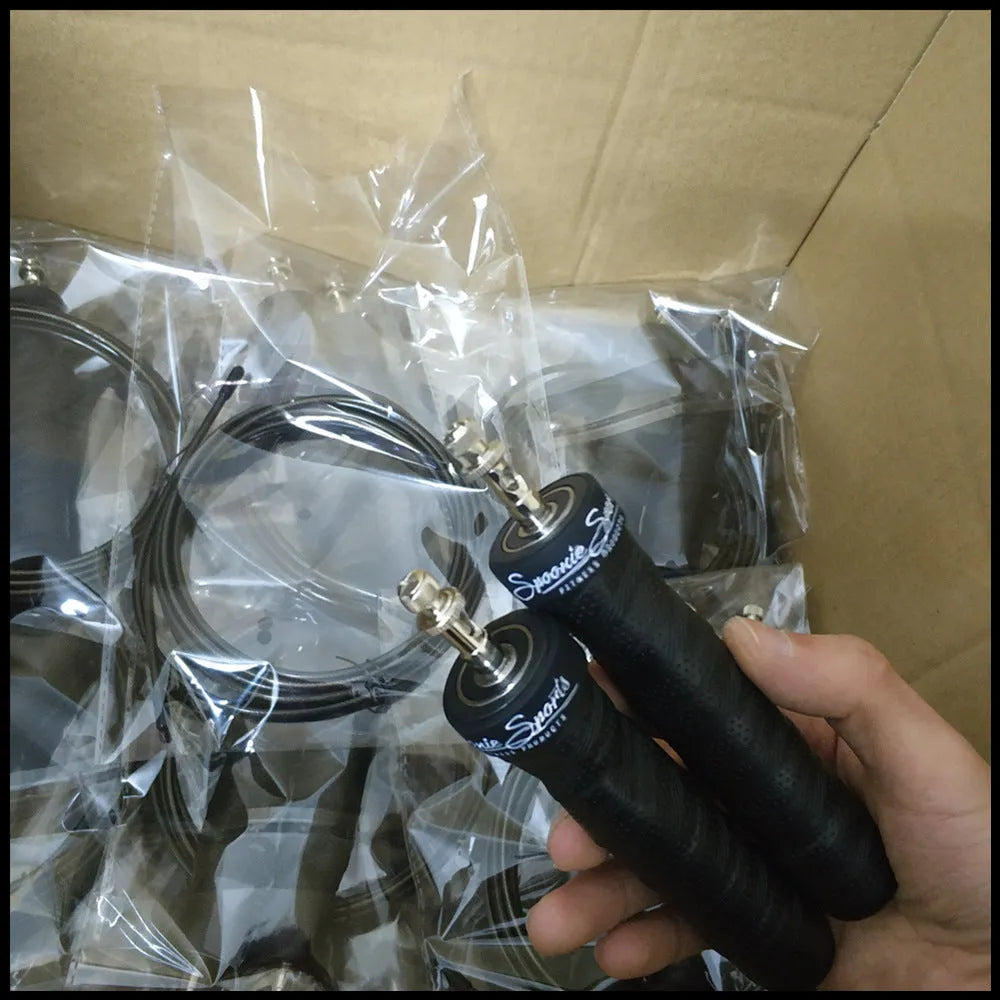 Jump rope for fitness with black PP handle, PU sweat band, and 3m PVC rope on gym floor