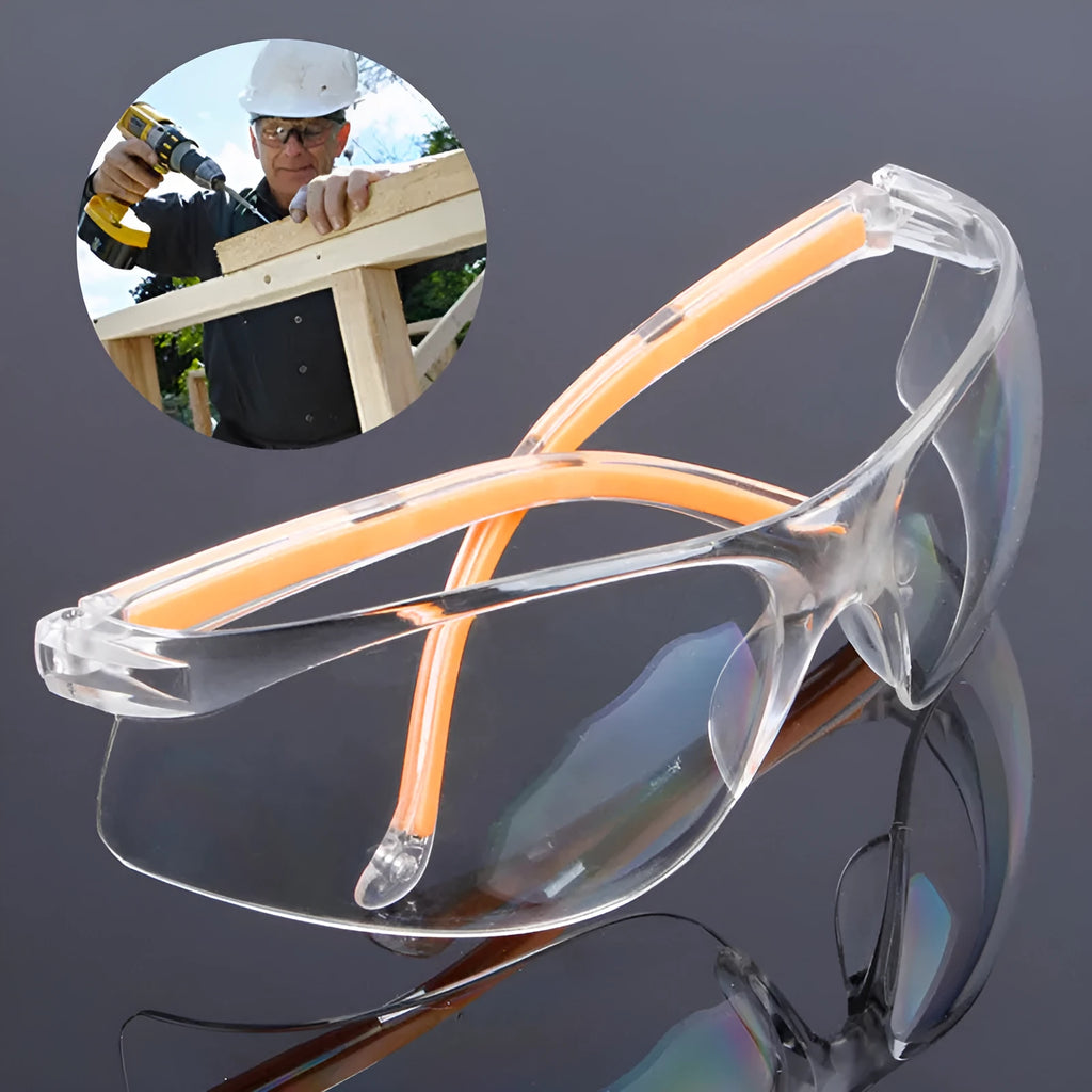 Transparent polycarbonate safety goggles with yellow frame for industrial and lab eye protection.