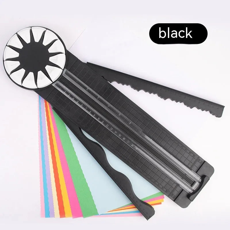 Pink 12-in-1 multifunctional paper cutting machine with dotted guide lines on its base.