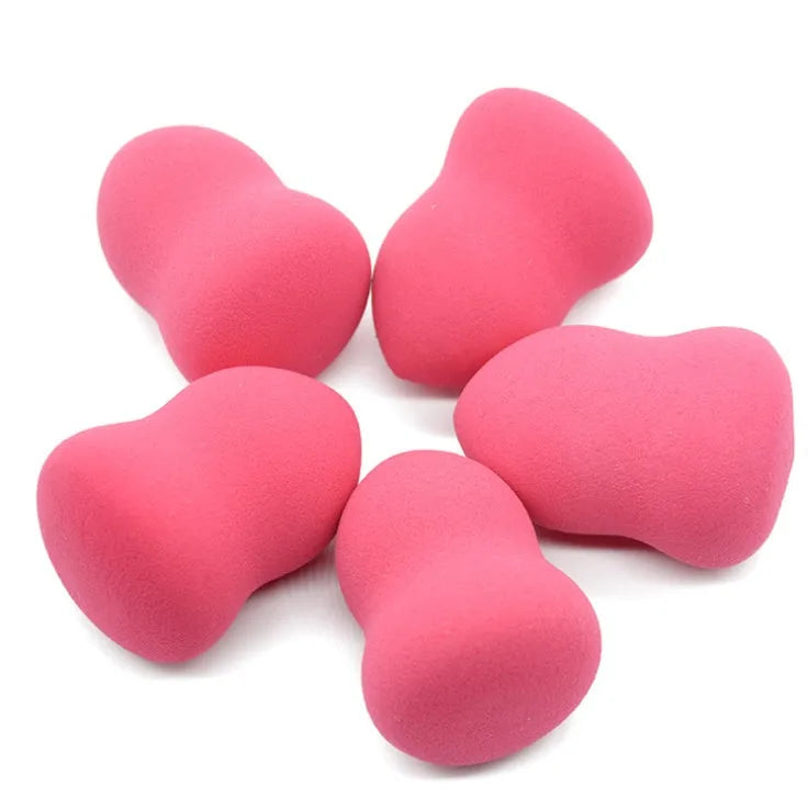 Pink makeup foundation sponge on white background showing soft texture and 4x4x5.6cm size