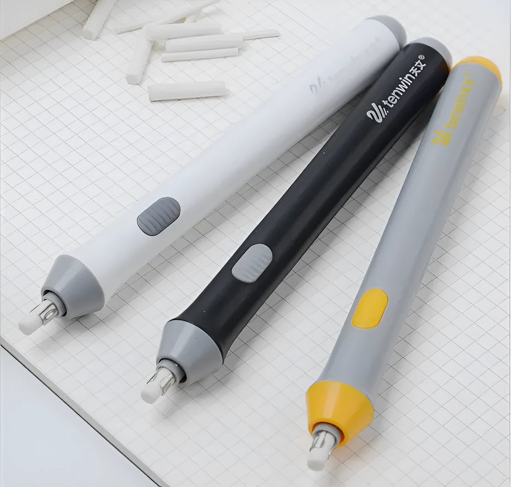 Black electric eraser with plastic body and geometric design on a white background