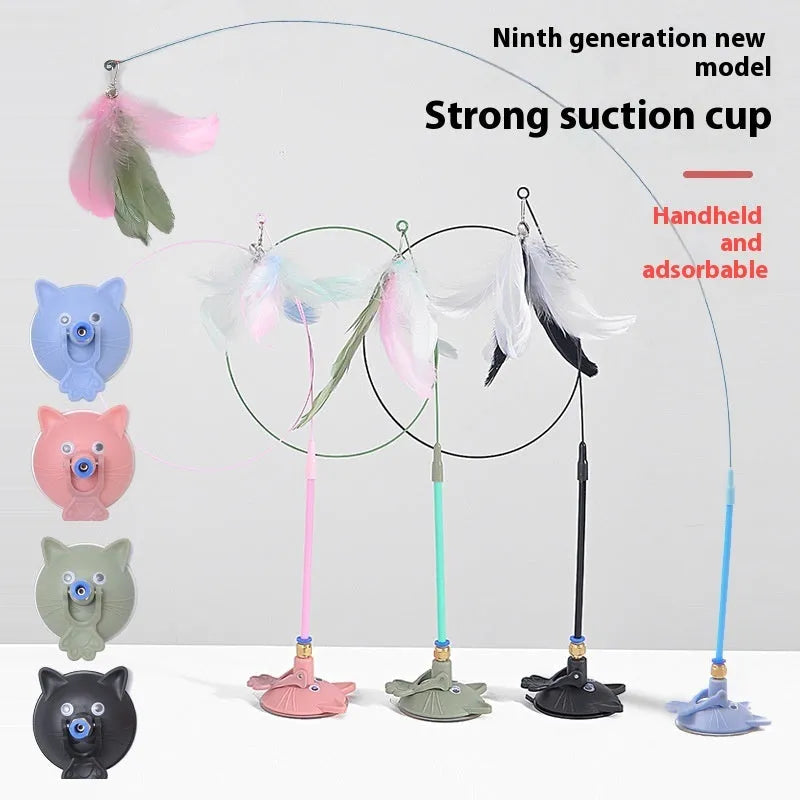Cat teaser wand toy with suction cup base and colourful cat face attachment