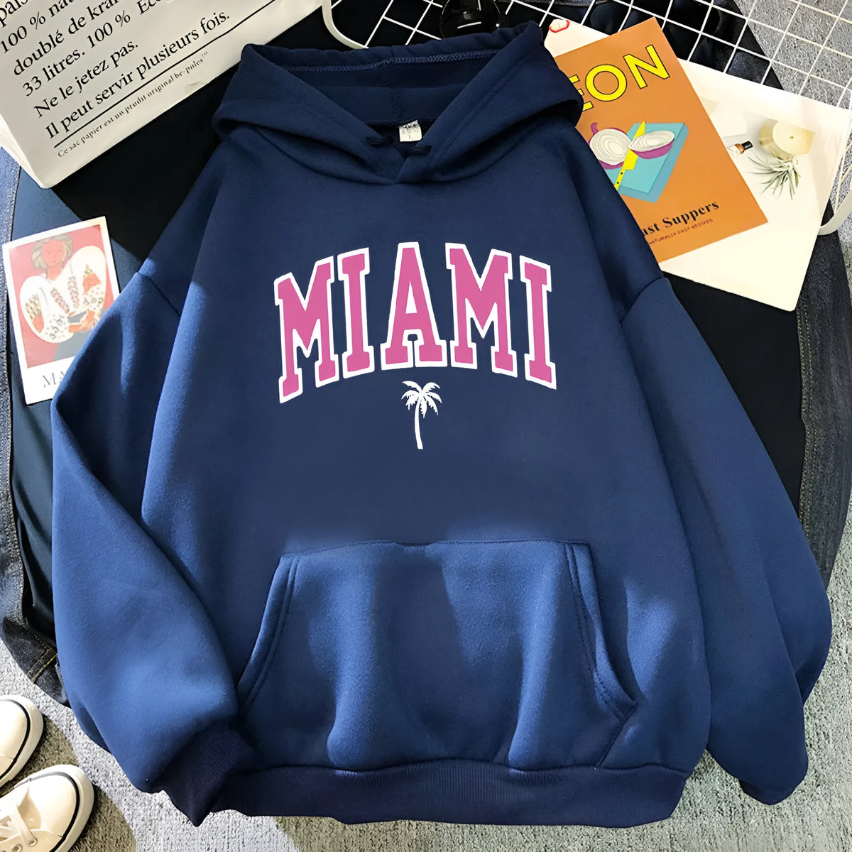 Women's loose pullover hoodie in polyester, shown in multiple colours including white, black, red and blue, sizes XS to XXXL