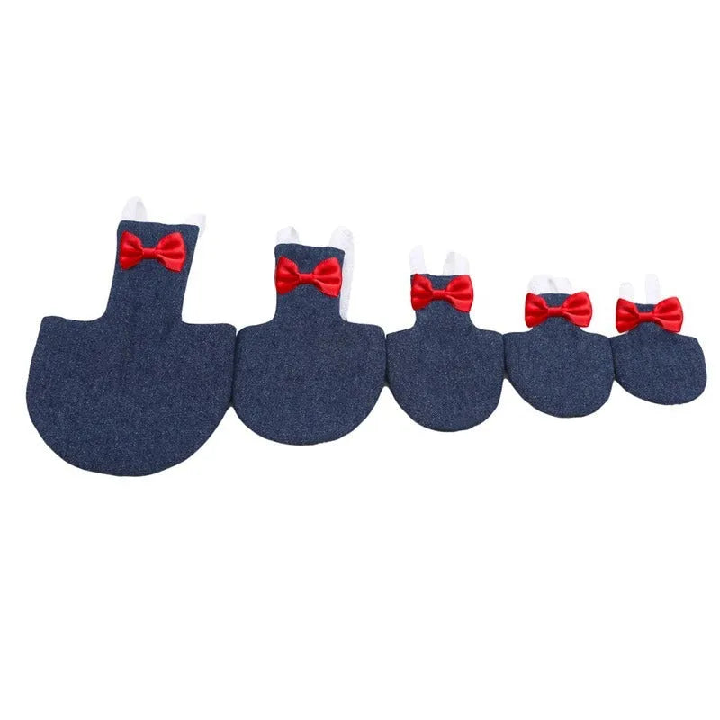 Parrot wearing a denim-style nappy diaper with metal fastenings, size L, on a perch
