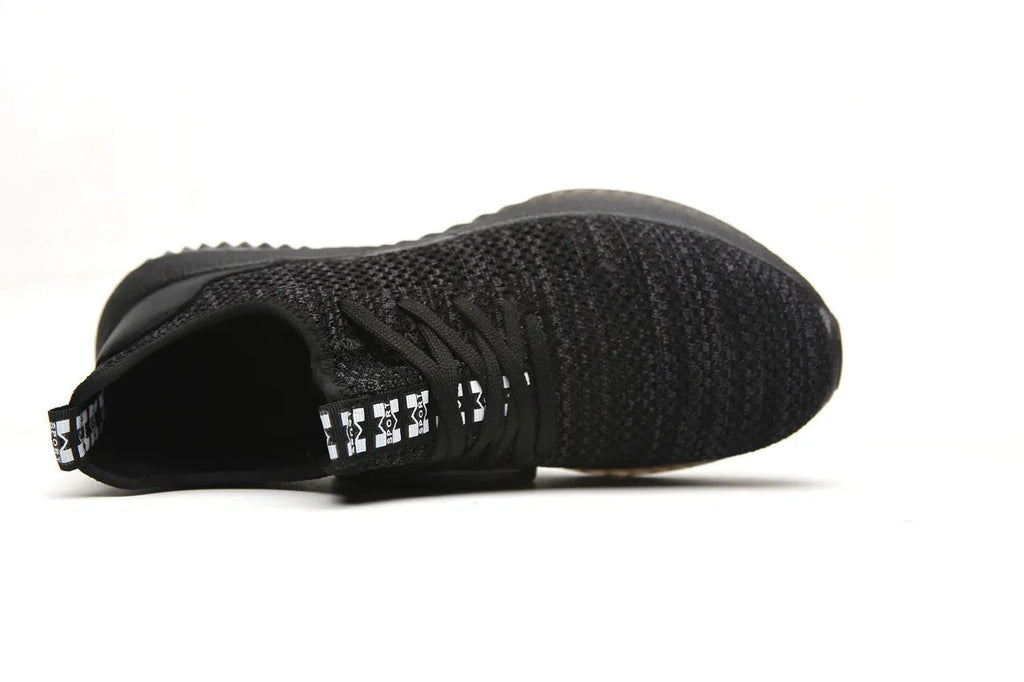 Black steel toe cap safety work shoes with a low-cut design and anti-static EVA sole.