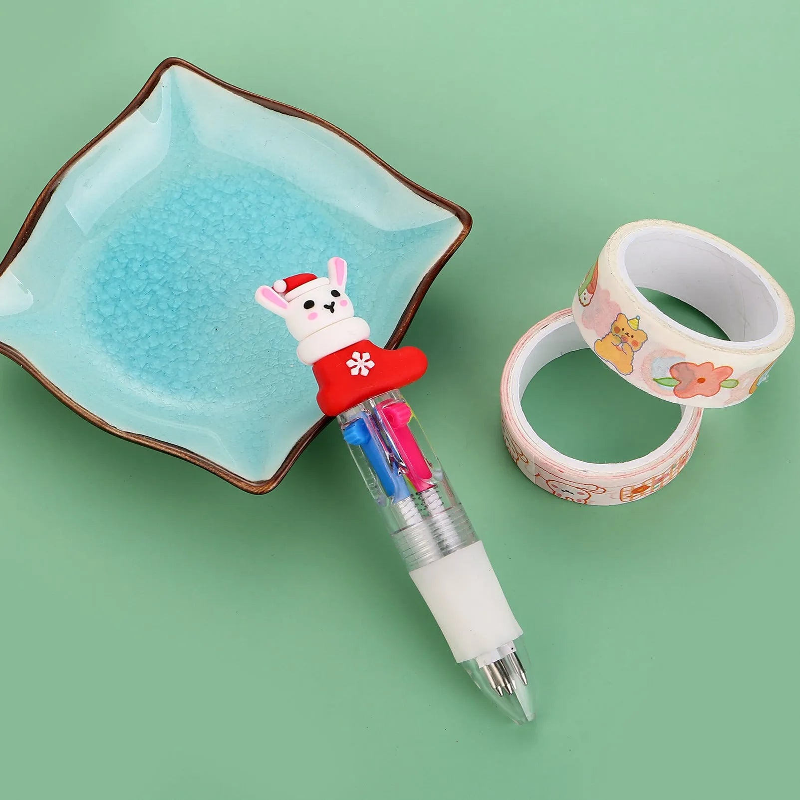 Christmas four-colour press ballpoint pen with festive designs, 11cm compact size