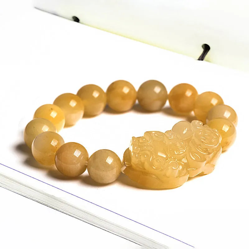 Carved Jinsi Jade Money Bracelet showing golden thread patterning, displayed in large and small size options.