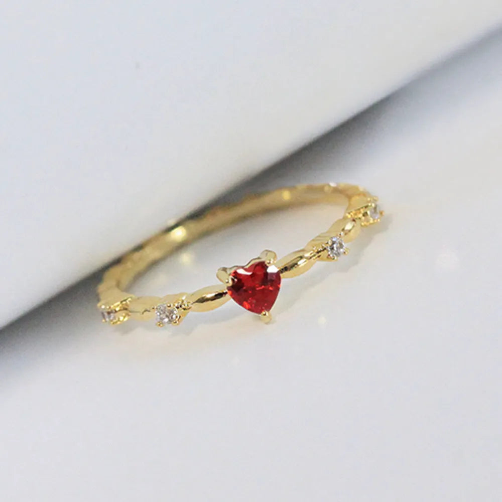 Gold or silver electroplated copper ring with peach heart charm and zircon detailing, sizes 6 to 10