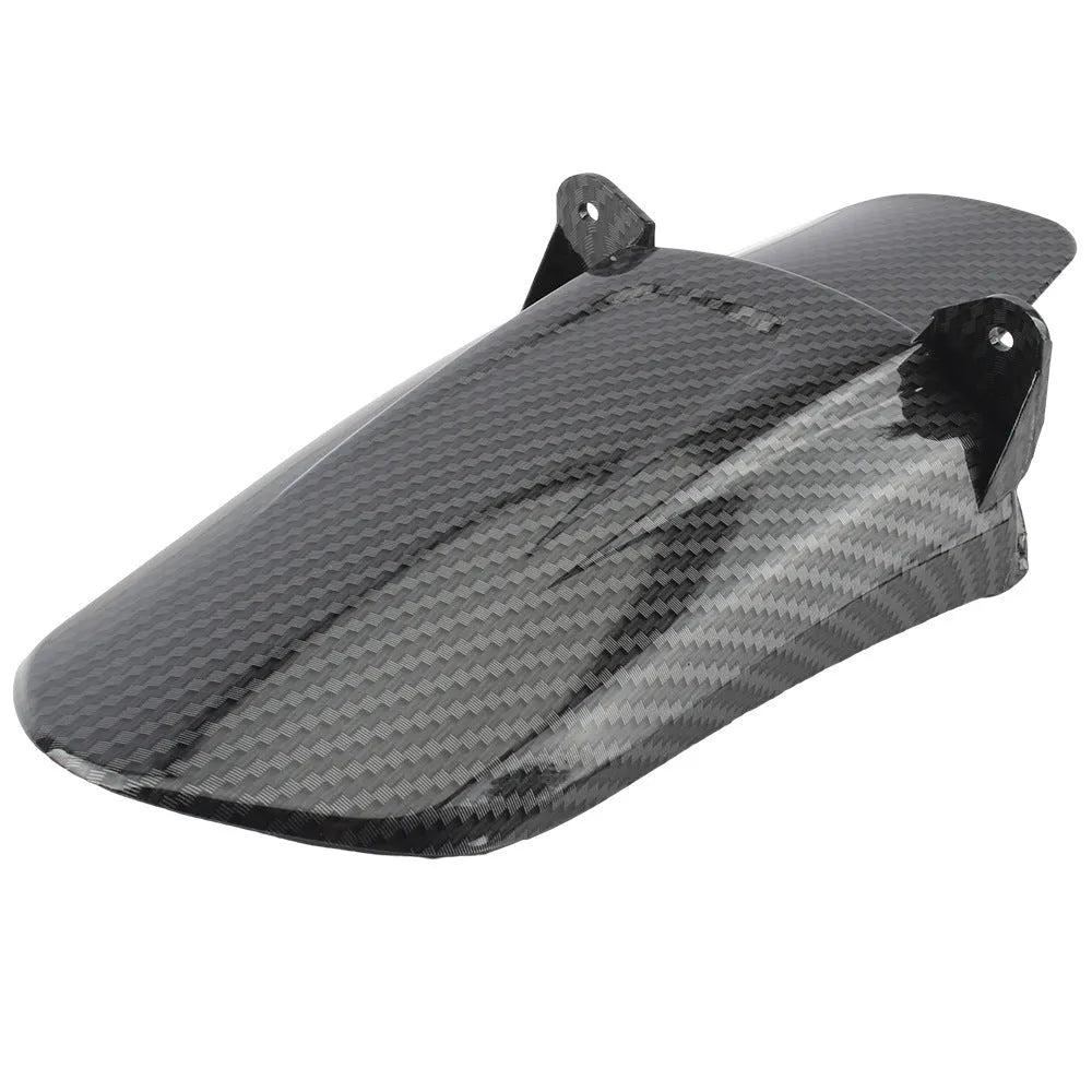Carbon fibre rear shock absorber fender for a light bee scrambling motorcycle.