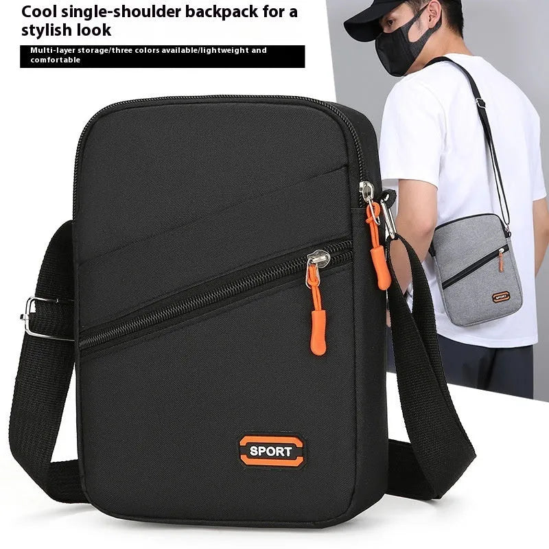 Oxford cloth crossbody commuter bag with contrast colour detailing in silver grey colour option