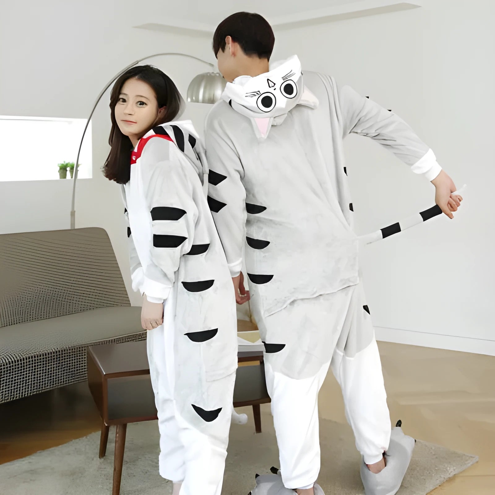 Grey animal one-piece pajama suit made from polyester fibre, available in sizes S to XL, front view